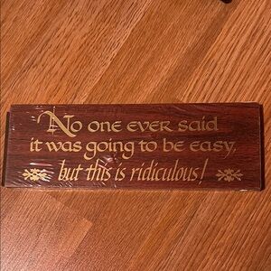 Decorative Wooden Sign with Gold Text
